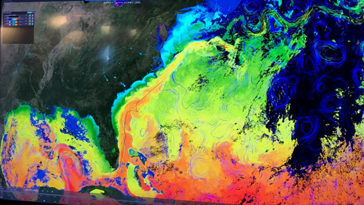 Temperature map with blue and green colors North, and yellow and red colors to the south.